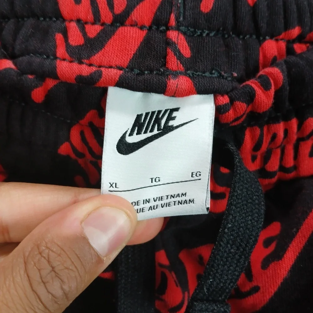Nike Sweatpants Boys XL Black Logo Print Elastic Waist Performance Tapered Leg